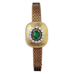Vintage Favre-Leuba Lady's Yellow Gold Diamond and Emerald Bracelet Watch circa 1960s