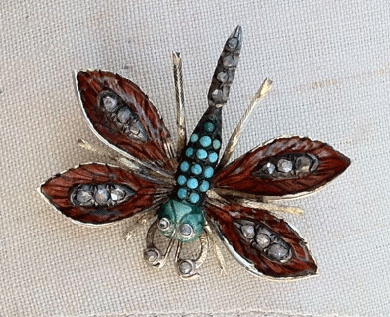 Fine early Victorian 'dragonfly' brooch. Gold item heavily enameled with rough bead set rose and OMC diamonds (.35 TW) plus turquoise cabochons. Charming design and fine execution. Original pin back intact.