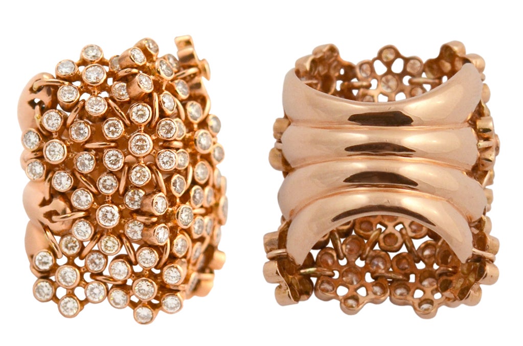 A stunning 18 kt. rose-gold diamond ring with 3.35 TCW of brilliant Diamonds.  The exceptional setting allows the ring to be malleable and therefore showing off the beauty of the cascading Diamonds. 

Ring size: US 6.5 and can be easily sized to