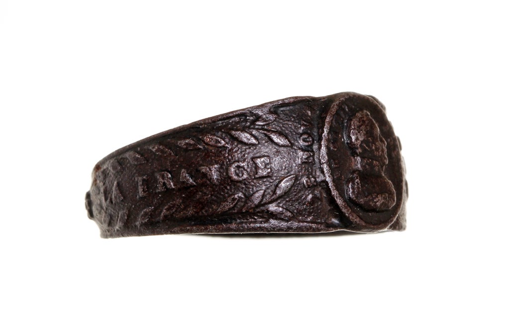 Rare French iron ring with intaglio of Napoleon with the words “La France en deuil”, roughly “France is in mourning” Circa 1821. An interesting and rare iron ring. The amount of Napoleonic memorabilia increased dramatically after the emperor's
