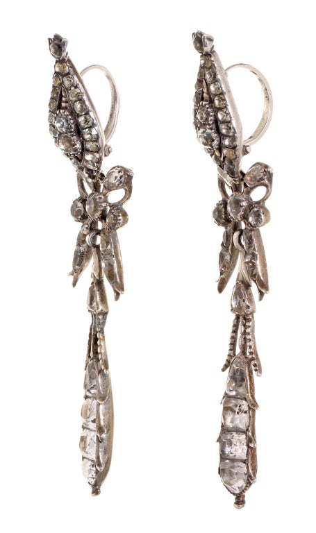 Late 18th century Portuguese pendeloque earrings. Beautifully set paste stones set in sterling silver.  Circa 1770/1790.  Hyper-romantic shape from the end of the 18th century.  A lengthened version of the traditional romantic proportioned jewelry