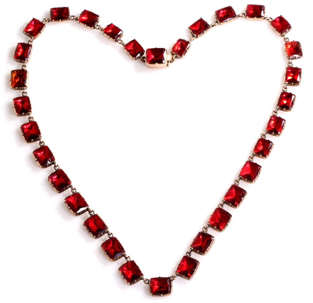 Bright red paste necklace circa 1800-1830. Set in 15-18k Gold. Push button clasp. 15.5