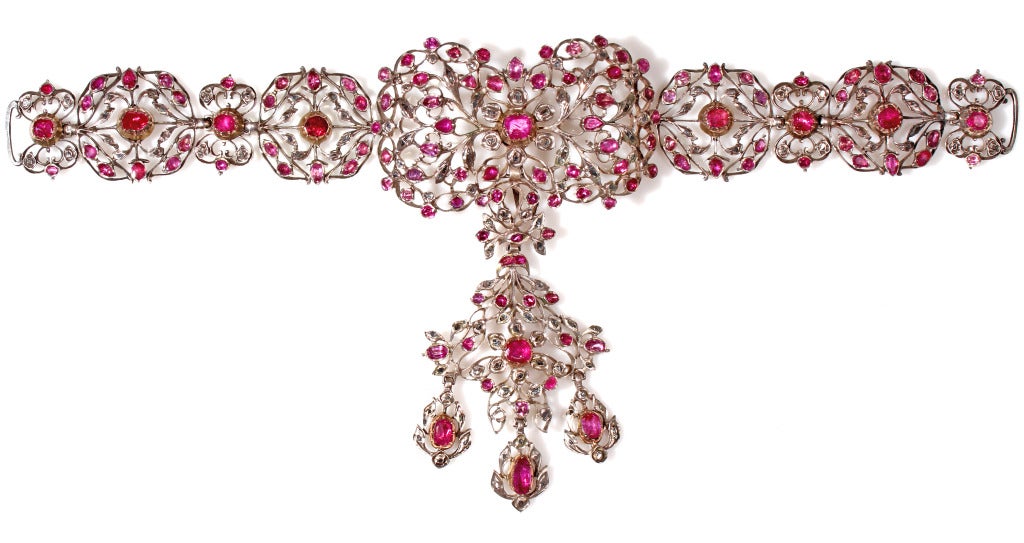 Consisting of natural rubies in gold collect settings and diamonds in silver, this piece was made in France or Italy in the second half of the 18th century. For well over a century, France dictated the fashion in elegance and luxury. In 1789, the