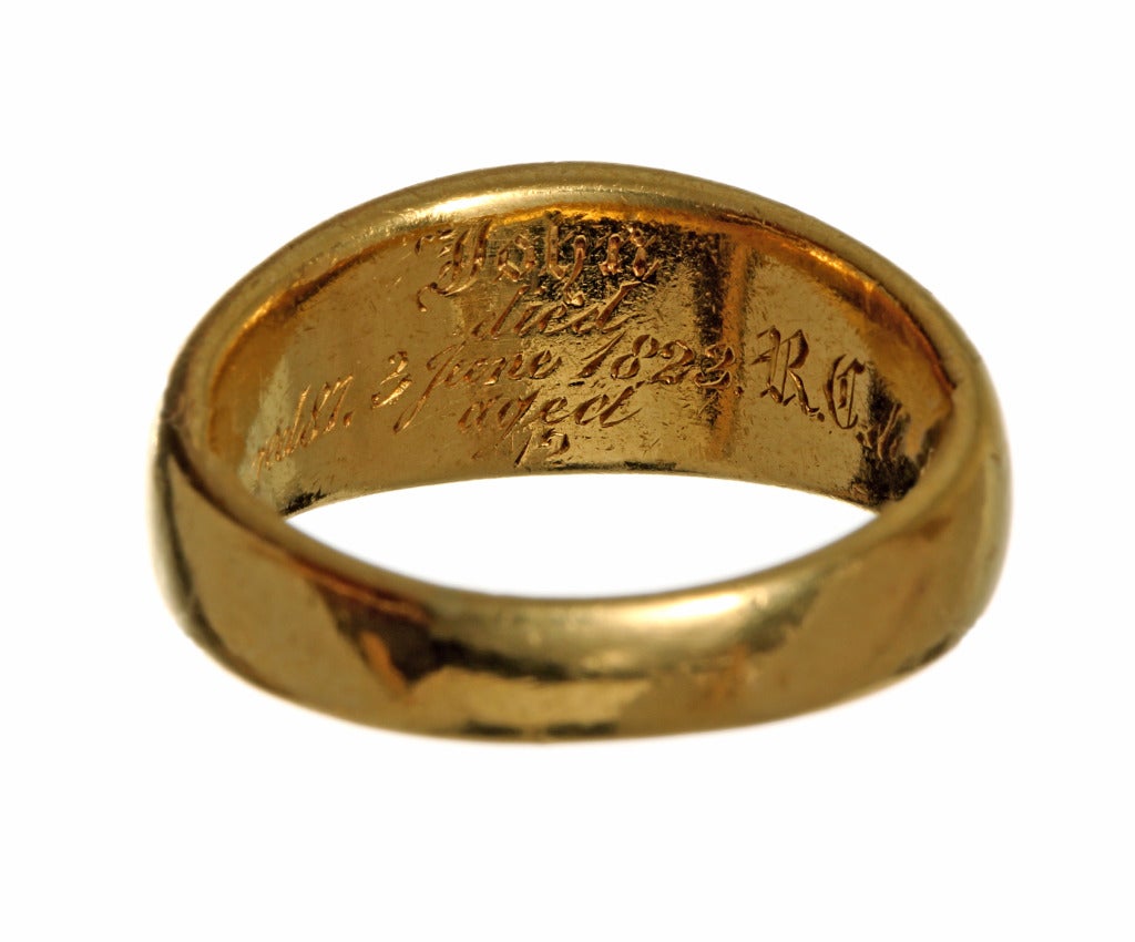 Rare portrait cut diamond mourning ring. The portrait diamond is one of the earliest diamond cuts, dating back to the Renaissance. The diamond was polished in a flat plane just as a glass would be, often to cover a miniature painted portrait. In