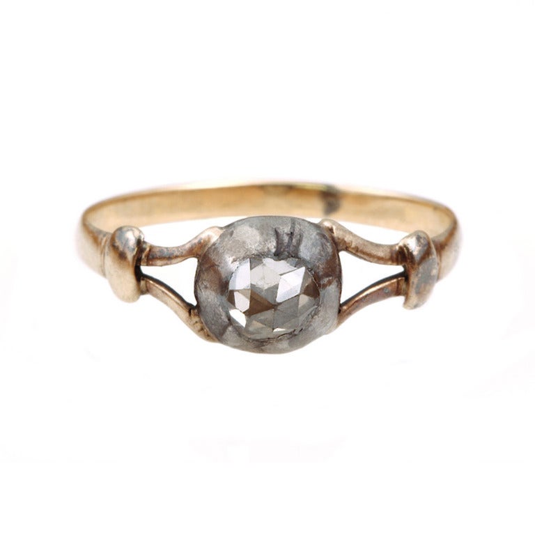 18th century diamond ring. Very tall pointed rose cut diamond ring set in a silver cut away setting on yellow gold shank. Early example in it's original state.  English in origin, circa 1780.