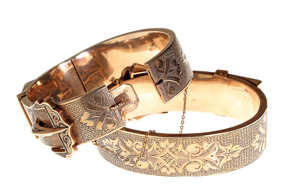 Wonderful & rare matched set of Victorian era gold bangles. Taille d'epargné enamel details on bold buckle designs.  The buckle was a common victorian motif standing for strength and loyalty.  A perfect sentiment for a set of wedding bracelets. A
