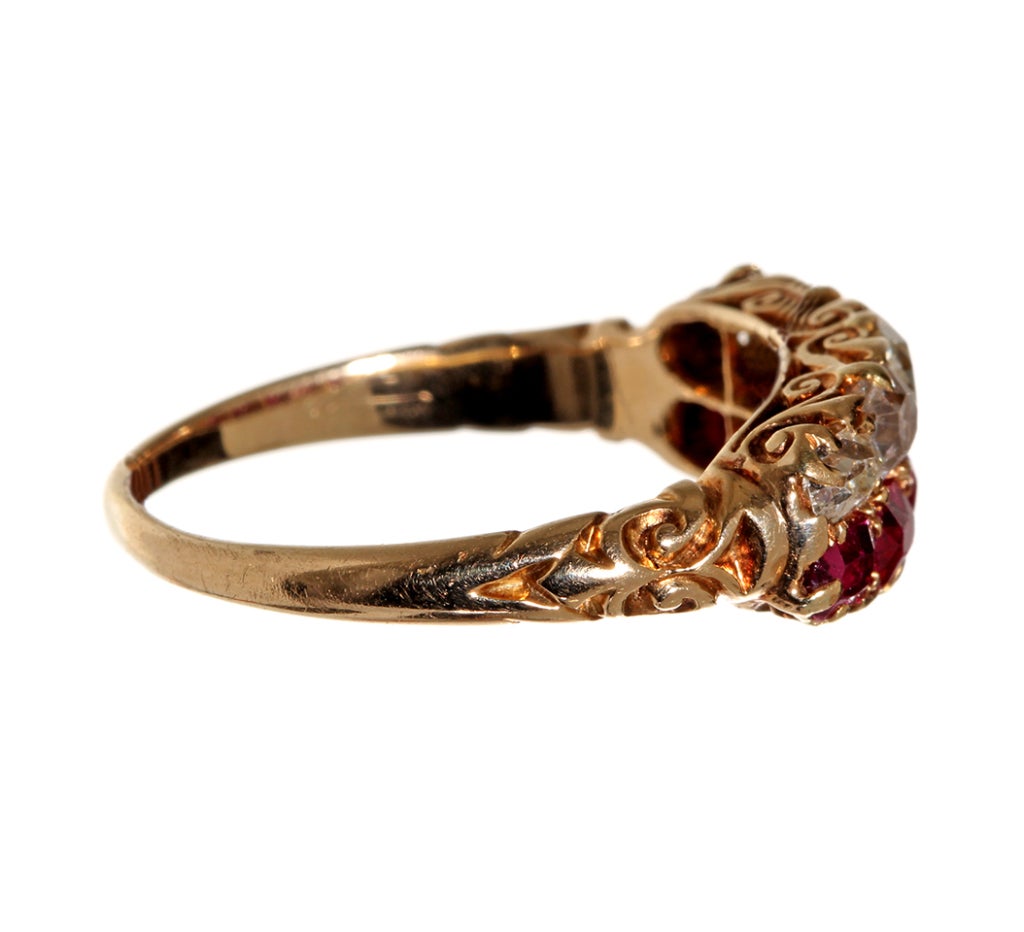 Natural rubies and unusual shaped mine cut diamonds set in 18k gold.
Size 7 3/4, can be sized. Shown with model's own 19th century mourning ring and our custom Simple Band Heritage Ring available at bellandbird.com.

Please see bellandbird.com
