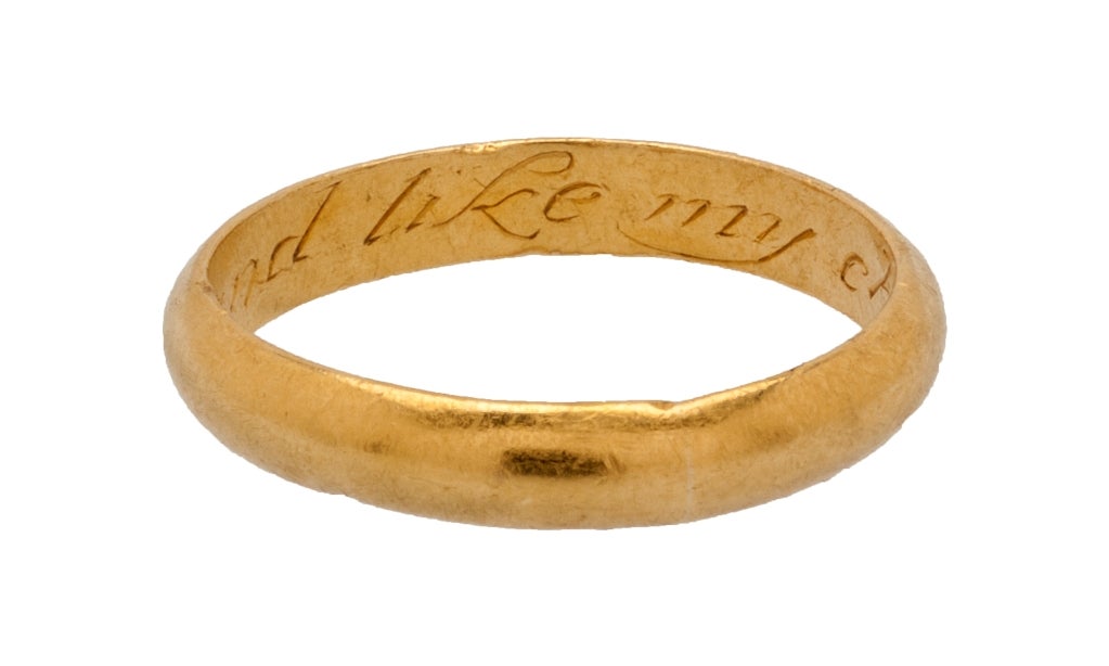Circumference 60.3 mm.; weight 5.1 gr.; US size 9.5, UK size S 1/2

Substantial hoop with rounded exterior. The flat interior features the engraved, inscription in italics, “I love and like my choise,” a common posy verse. The ring is in excellent