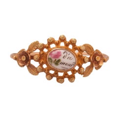 Antique Gold and enamel ring "D'amour"