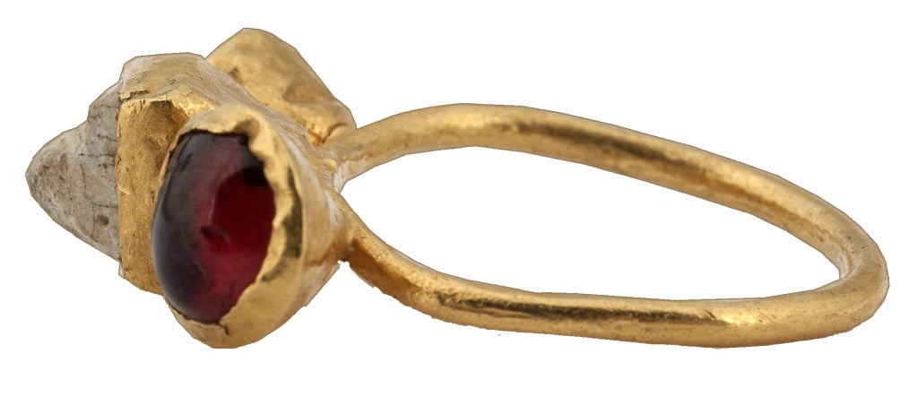 Gold, pearl, carbonized stone, and garnet
Circumference 45.5; weight 2.7 gr.; US size 3.5; UK size G

This ring, believed to have been found in Ravenna, is of the Ostrogothic type. Originally from Northern Europe, the Ostrogoths moved South and