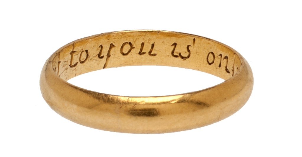 Circumference 49 mm.; US size 5, UK size J 1/2. 
A small, but solid, ring with center bevel on the exterior and flat interior. The interior is engraved in italics with “Respect to you is only due,” with the “R” and “s” linked.  The goldsmith’s mark