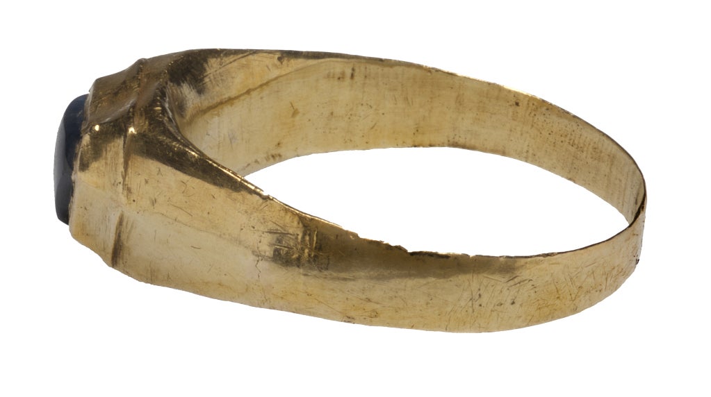 Bezel 5 x 7 x 5 mm.; circumference 57; weight 2.2 gr.; US size 8; UK size P ½ 

The elaborate setting of this stirrup ring, so named because it looks like a horseâ??s stirrup, suggests a date as late as the 15th century.  The arch-shaped form