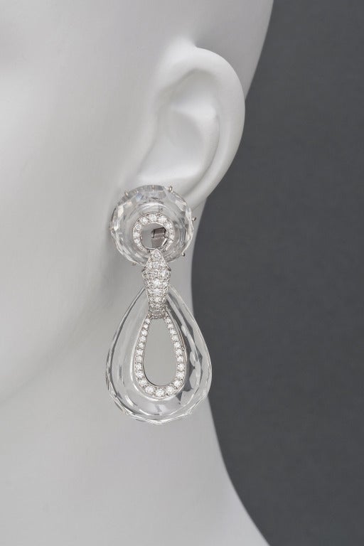 Carved rock crystal 2-drop earrings, with pavé diamond inner frames and connector, set with 122 circular-cut diamonds weighing approximately 3.00 total carats, mounted in platinum, with omega-style clip backs, signed 