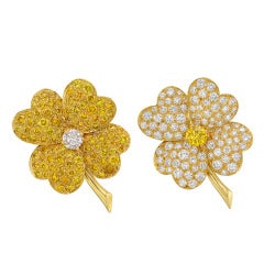 Van Cleef & Arpels Pair of Yellow and White Diamond "Cosmos" Pins