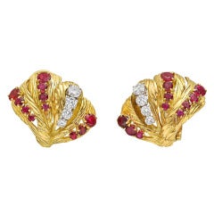 Van Cleef 
Arpels ​Gold, Diamond 
Ruby Foliate Earclips