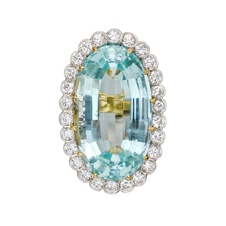 Elongated Oval Aquamarine Ring with Diamond Surround