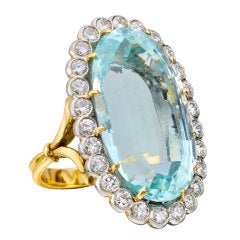 Elongated Oval Aquamarine Ring with Diamond Surround