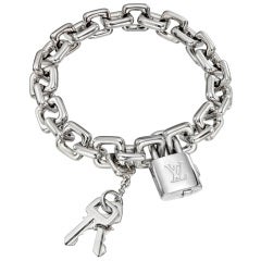 Superb new Louis Vuitton bracelet with padlock Brown Cloth ref.184845 -  Joli Closet