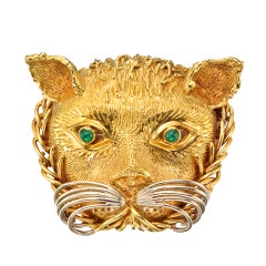 CARTIER Gold Tiger Mask Pin with Emerald Eyes