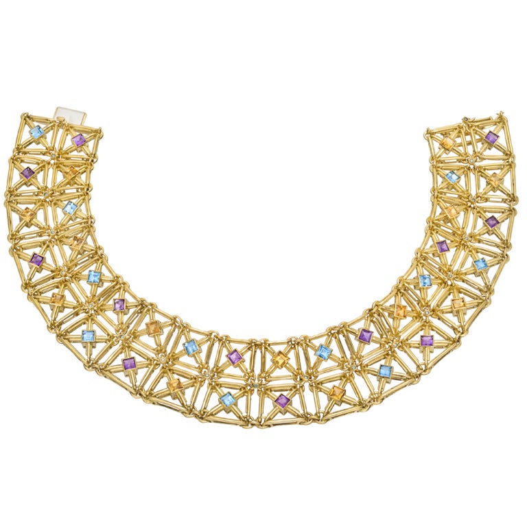 Heavyweight gold necklace, designed as a two-row lattice-style wide choker, set with square-shaped citrine, amethyst and blue topaz, mounted in 18k yellow gold, signed 