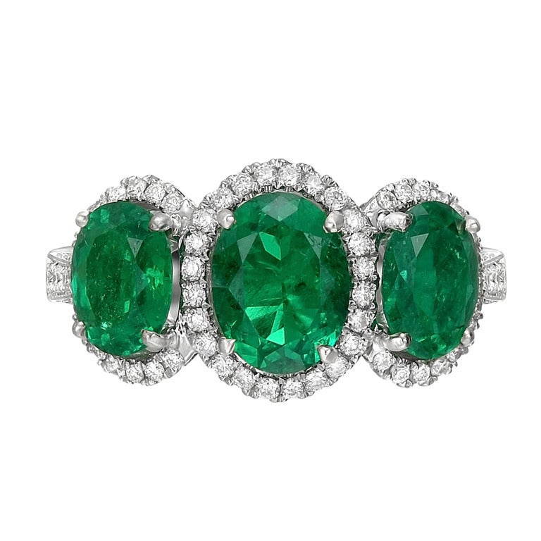 Oval-Cut Emerald Three-Stone Ring at 1stdibs