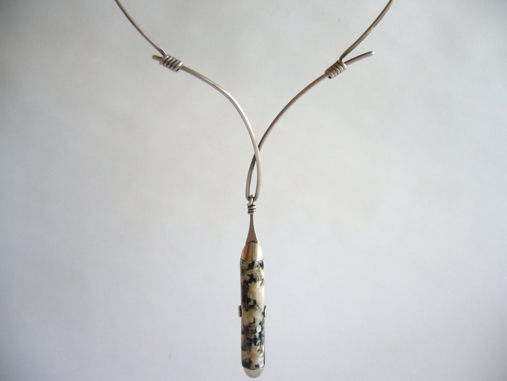 Graceful agate pendant necklace designed by jeweler Ronald Hayes Pearson of Rochester, New York.  Pendant measures 3 1/4