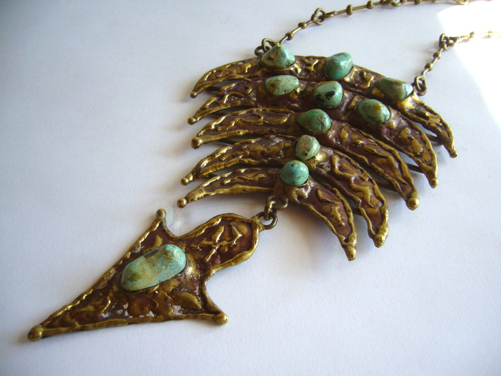 A bronze and turquoise articulating necklace by Pal Kepenyes of Acapulco, Mexico. Kepenyes was born in Hungary and emigrated to Mexico in the 1960's.  Pendant measures a massive 7 1/8