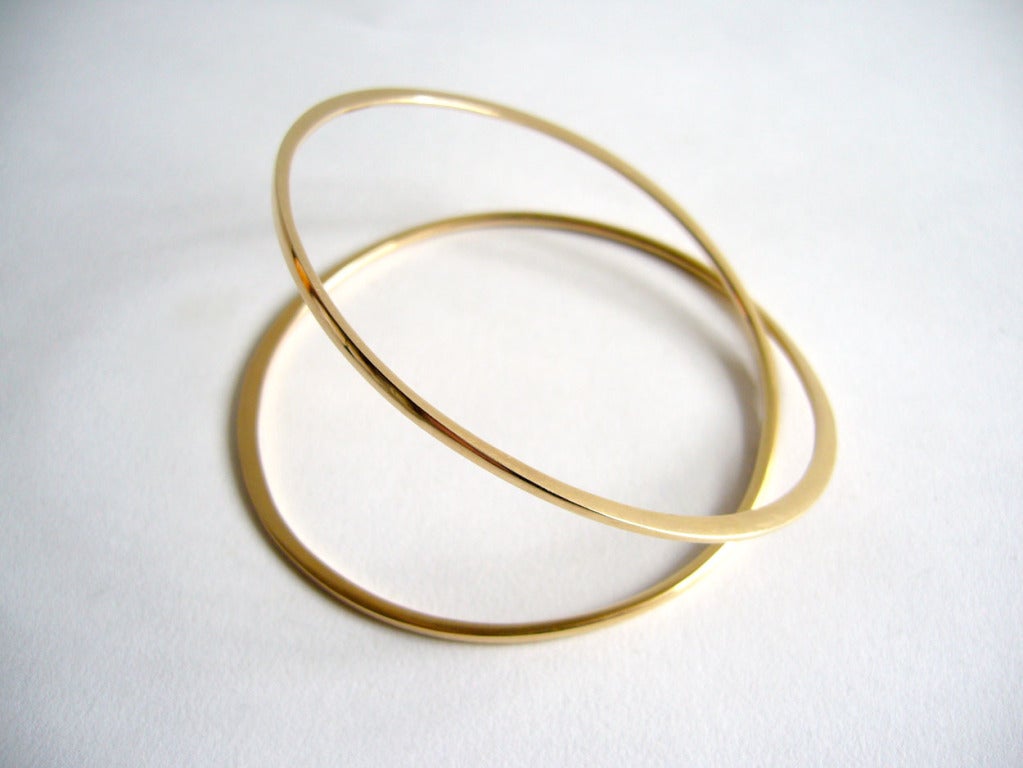 An undulating 14k gold bracelet designed and created by Betty Cooke of Baltimore, Maryland.  Bracelet measures about 8 1/4