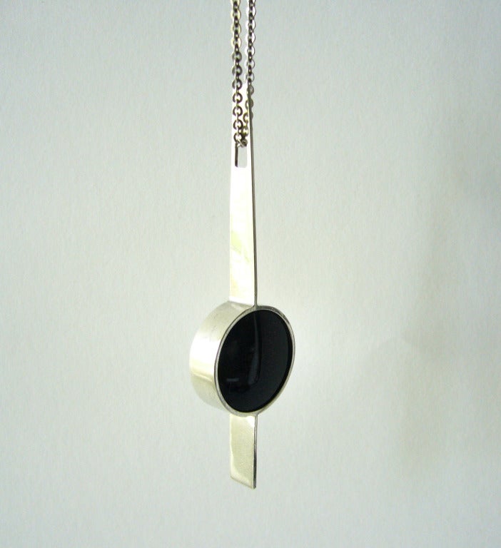 A sterling silver and onyx pendant necklace designed and created by mid 20th century American studio jeweler, Idella La Vista.  Pendant measures 4