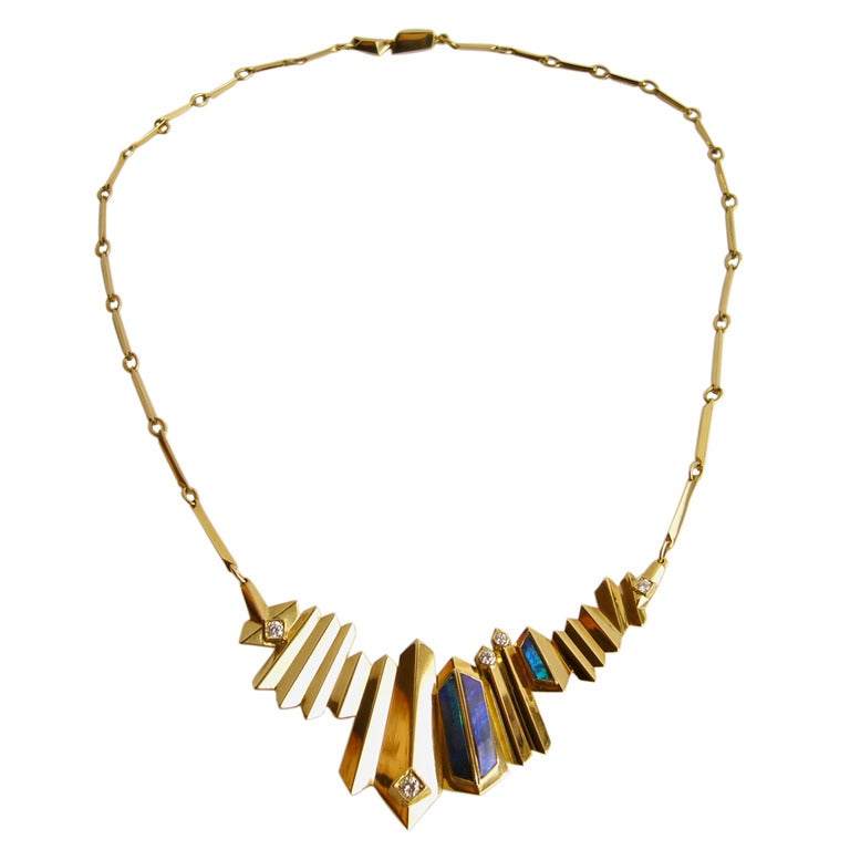 A 1970's European 18k gold, black opal and diamond custom made necklace.  Necklace has about 20