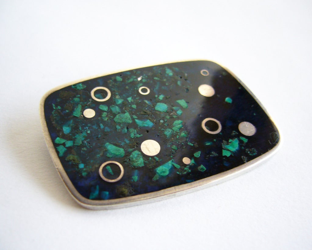 Brooch of sterling and laminated lapis lazuli and turquoise created by Frances Holmes Boothby of Weston, Vermont.  Brooch measures 1 1/4