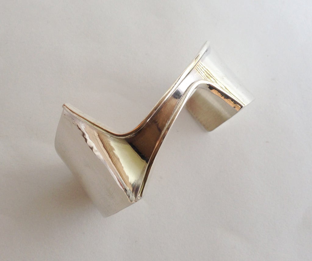 A sterling silver cuff bracelet created by merry renk of San Francisco.  The following was taken from Marbeth Schon's site about the very same bracelet:  

About this piece, merry renk said, 