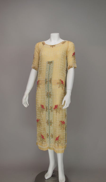 Motoring down Belleview Ave. and out to Bailey's Beach this summer? Do it in true Daisy Buchanan style...A gorgeous yellow cotton frock from the 1920s...perfect for any summer fete...this one has beautiful Venetian glass beads in floral abundance