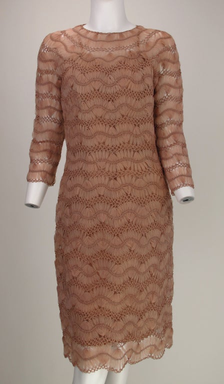 Vintage with a modern twist as only the Italians know how. Sexy body hugging dress that is oh so wearable. Cocoa silk ribbon is crocheted and connected with twisted silk ribbon, round neck, 3/4 length sleeves, closes at neck back with 2 self buttons