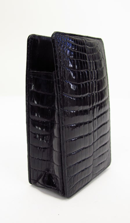 Vintage glazed black alligator cigarette case, lined in black leather...unused in excellent condition. Measurements are: 3 3/8