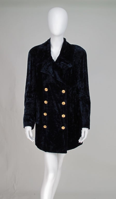 Always classic & always in style...Blue crushed velvet pea coat from Chanel…Princess seamed, double breasted with matte gold Chanel logo buttons…on seam hip front pockets…wide deep notched lapels...deep center back vent…jacket is fully lined… All