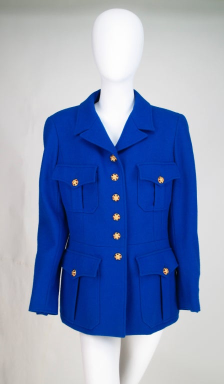 Chanel jewel button royal blue wool jacket 1990s...Gorgeous blue wool military/safari style jacket, princess seamed with jewel buttons at front and cuffs...Double breast and hip flap pockets...Seamed waist with flare hem...This jacket looks great