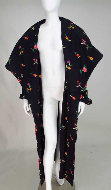 Norma Kamali OMO, reversible, open front maxi coat in printed rayon crepe...The larger print has certainly been taken from a 1920s Canton embroidered shawl...Opera style maxi coat with deep shawl collar,which is padded...Long sleeves with turn back