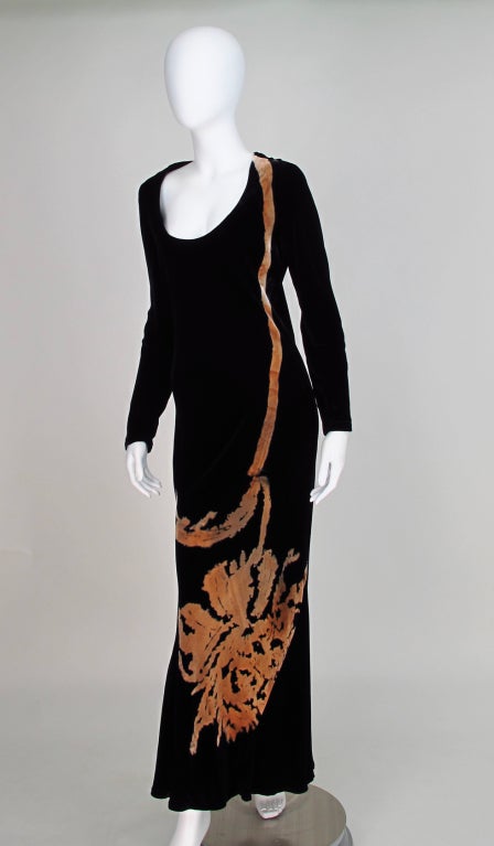 Black velvet gown with abstract falling flower painted from shoulder to hem...In the 1990s the Susan Unger fashion line was picked up by Barneys and Charivari in New York where Donna Karan fell in love with the colors, textures and prints of the