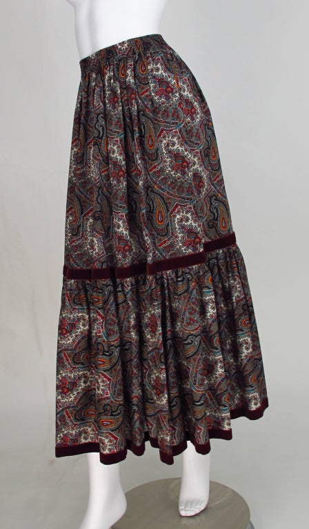 Never out of fashion and perfect for layering winter, spring & fall...1970s peasant skirt from Yves St Laurent, Rive Gauche...fine wool challis in a paisley design with Burgundy velvet trim...pull on style with elastic waist, on seam side