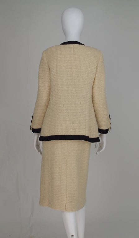 Iconic Chanel suit at 1stDibs | whose creation is the iconic boxy suit ...