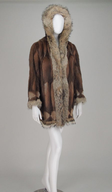 Lux fur ski parka, Somper furs Beverly Hills California 1980s...Sheared muskrat with a diamond pattern hem and cuffs, trimmed in coyote, deep hood, closes at front with hooks, fully lined in cream satin...In excellent vintage condition looks barely