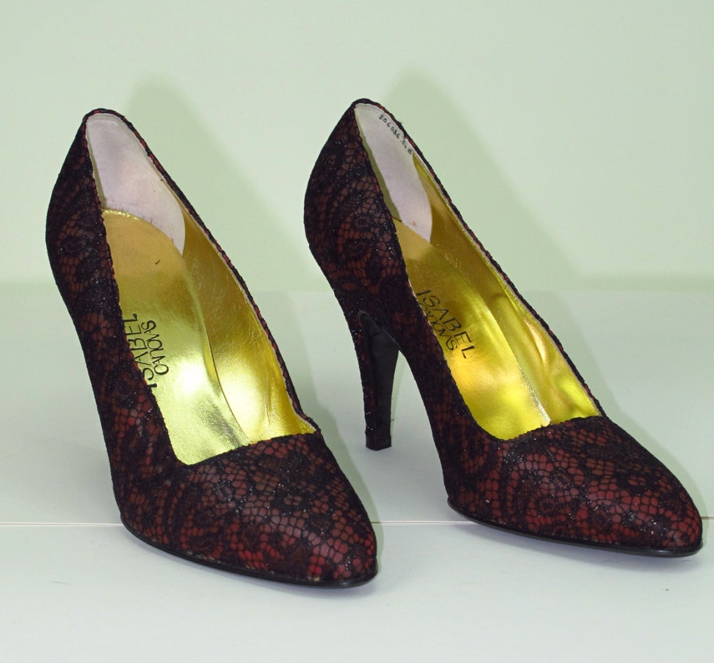 Gorgeous, Isabel Canovas black lace over claret silk pumps, lined in gold......Unworn in mint condition...Marked size 5 1/2 B....French born Isabel Canovas, began work at an early age as an accessories designer at Hermes and later at Louis Vuitton.