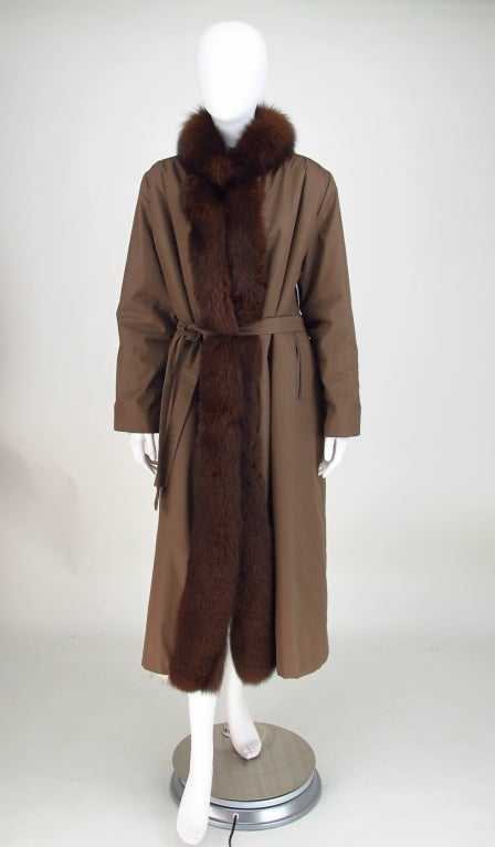Winter storm coat from the 1990s...Cocoa brown poplin coat is trimmed at the neck and front facings in Russian sable, the body of the coat is lined in luxurious Russian fitch...Bound side front pockets, long sleeves are interlined for warmth and