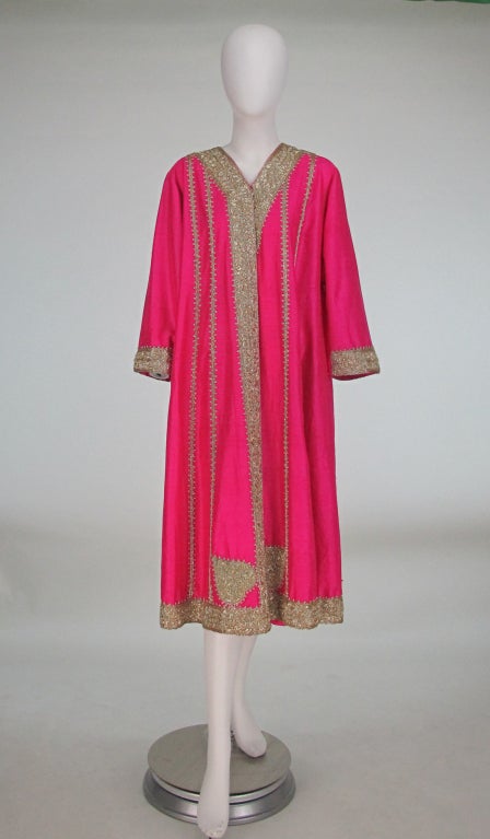 1960s Hot pink silk caftan coat with gold bouillon embroidery