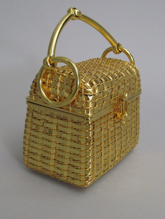 Brown 1960s Rodo Italy gold and Fabulous horse bit handbag