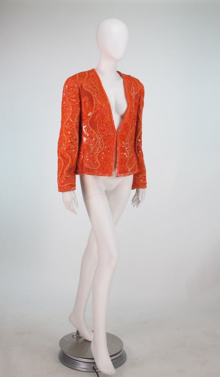 This is such an amazing colour combination, persimmon & hot pink beads and sequins shimmer all over this gorgeous evening jacket from Bill Blass...Undulating patterns give texture and depth to this very tactile design...Bill Blass from the