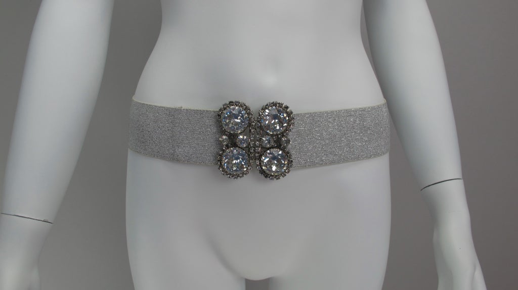 Sparkle your way into the night with this wide silver lurex belt and huge rhinestone buckle from Christian Dior.
