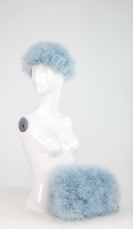 Frank Olive sold at Saks Fifth Ave...French blue marabou hat and matching muff to keep your hands warm...Pill box shape hat is covered in fluffy marabou...Narrow fabric band at edge, unlined with net interior...The matching muff has the original