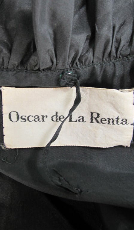 1960s Oscar de la Renta black silk halter neck gown 3